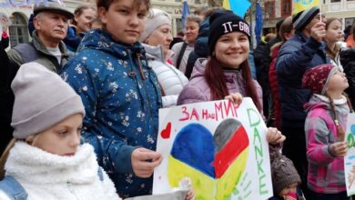 Беженці з України